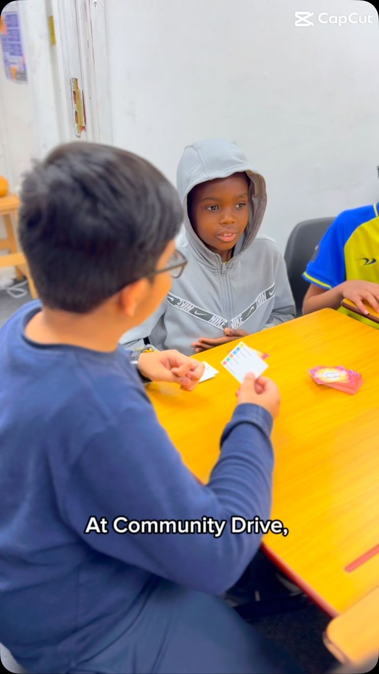 At Community Drive, we believe in learning through play! Watch our students dive into UNO and Articulate - building trust, sharpening com...